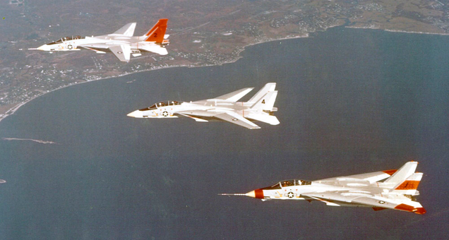 Three F-14 Tomcat prototypes demonstrate the variable-sweep wing during a formation flight in 1972.